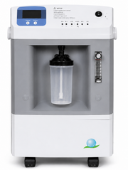A medical oxygen concentrator machine with a white and gray body, featuring a digital control screen on the top left, an oxygen canister in the center, an oxygen flow meter on the right, and a small green and blue logo at the bottom right.