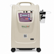 An oxy-med portable oxygen concentrator on wheels, featuring a beige body, a purple control panel, and an oxygen tank connected on the right side.