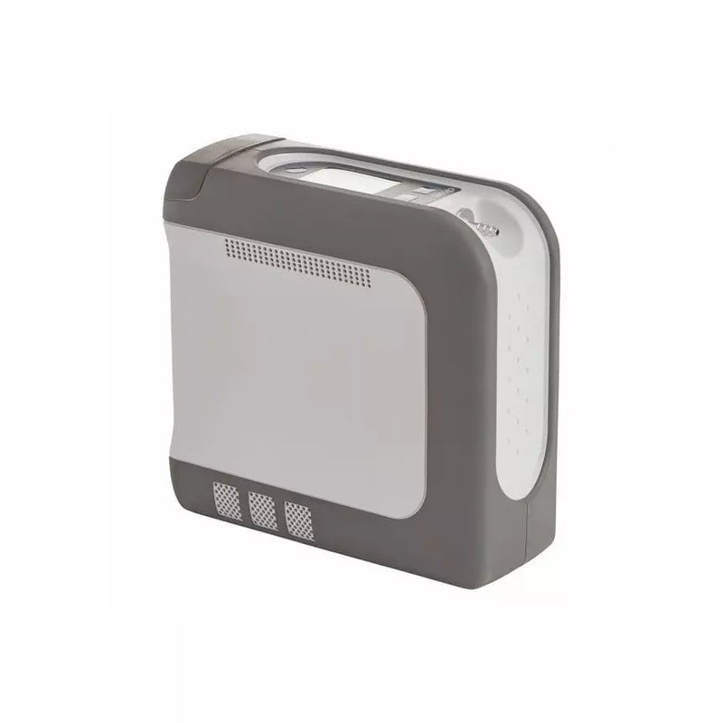 A compact gray and white electronic device, possibly a portable heater, humidifier, or air purifier, shown from a three-quarters angle on a plain white background.