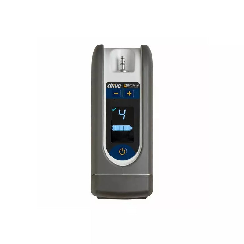 A drive iMed30 portable oxygen concentrator shown against a plain white background. The device has a dark gray outer casing, a silver top panel, and a central blue and black digital display screen.