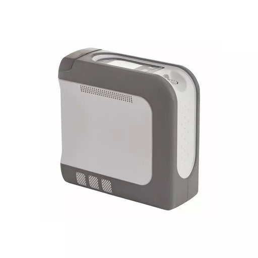 A compact gray and white electronic device, possibly a portable heater, humidifier, or air purifier, shown from a three-quarters angle on a plain white background.