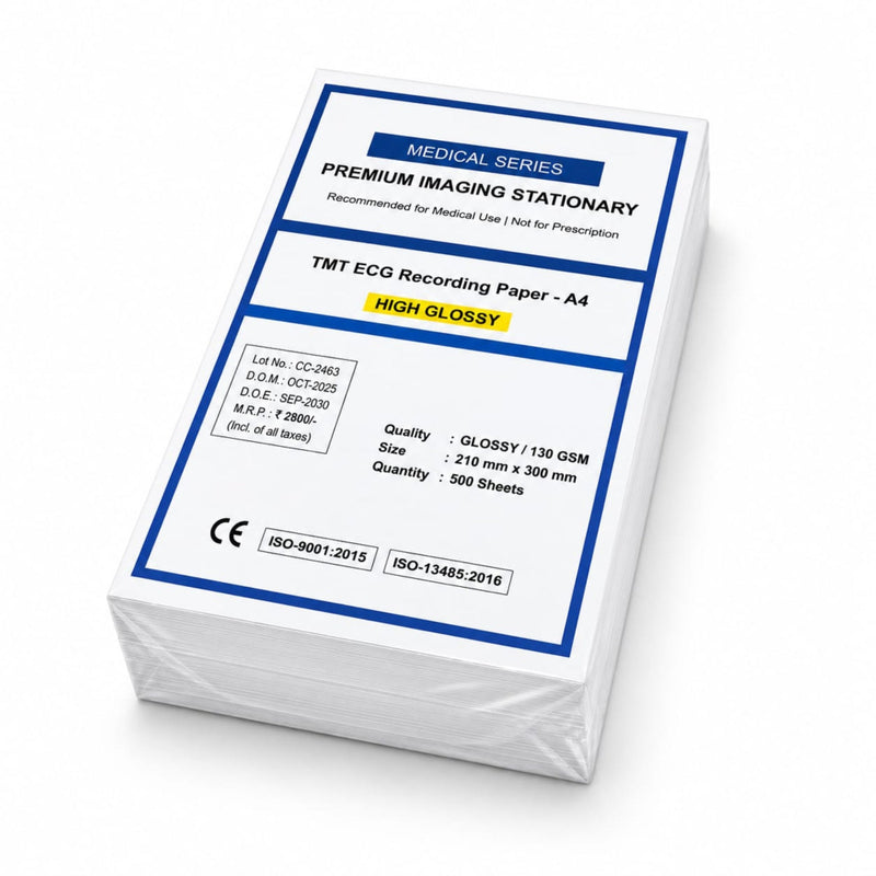 A stack of TMT ECG Recording Paper A4 sheets in a clear plastic wrap, showing the white paper with blue and black printed text on the front cover.