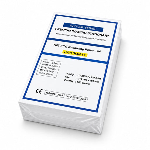A stack of TMT ECG Recording Paper A4 sheets in a clear plastic wrap, showing the white paper with blue and black printed text on the front cover.