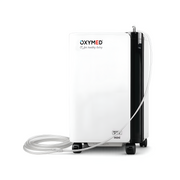 OXYMED mini oxygen concentrator in white and black with a clear tubing connection, shown on a white background.