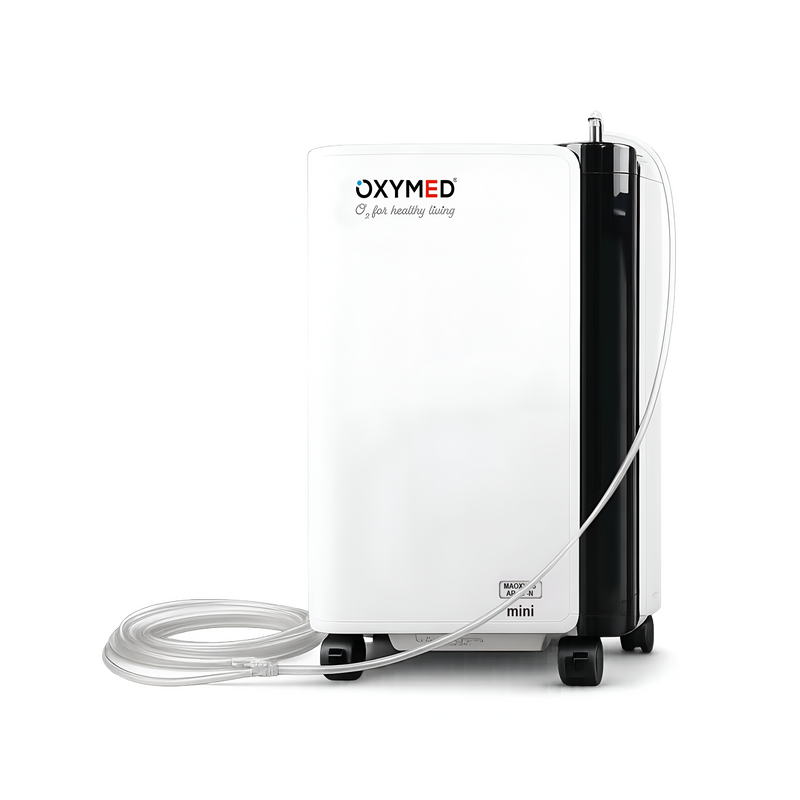 OXYMED mini oxygen concentrator in white and black with a clear tubing connection, shown on a white background.