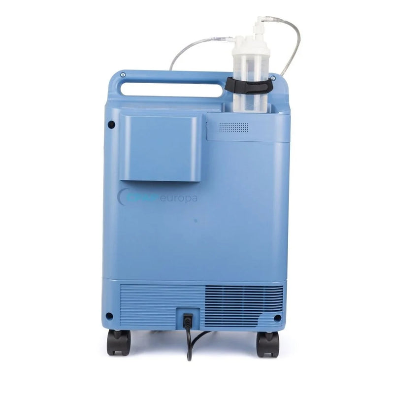 Back side view of Philips EverFlo oxygen concentrator displaying the power cable, cord wrap, and air inlet filter